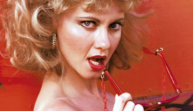 Olivia Newton – John hvetur til skógræktar